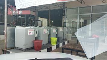 ซักผ้าหยอดเหรียญ