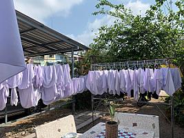 A clean ซักอบรีด (Laundry shop)